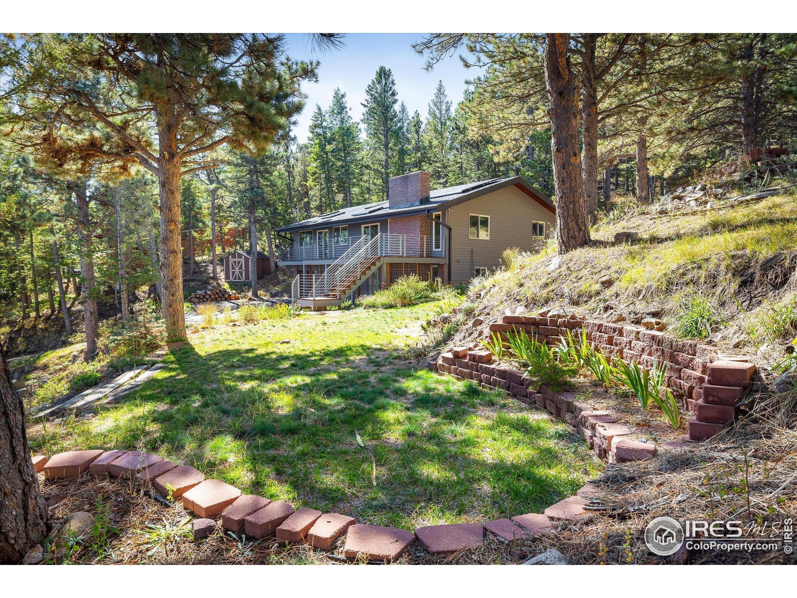 74 Sky Trail Road Boulder, CO 80302 - Photo 28 of 34 a view of a backyard