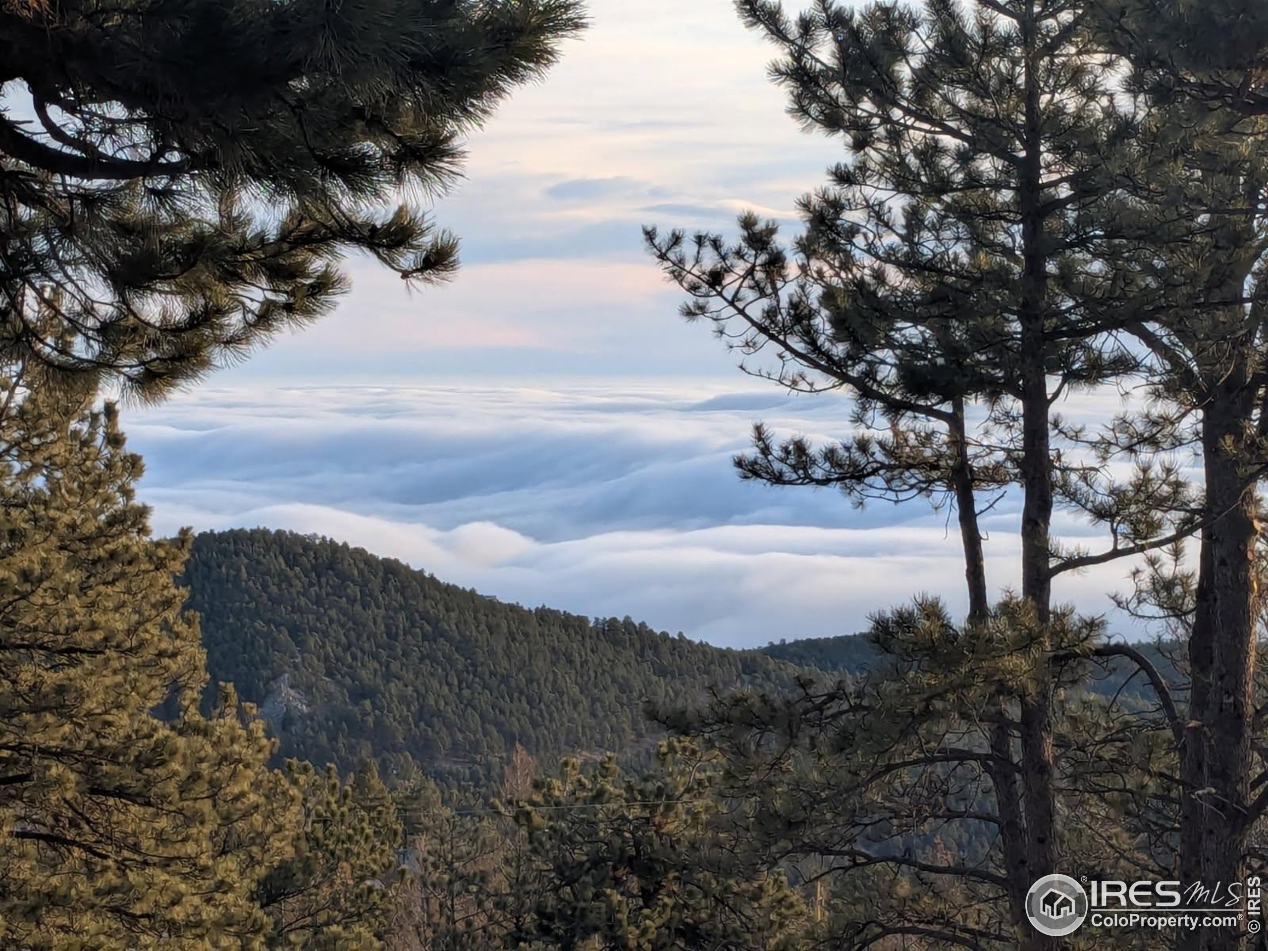 74 Sky Trail Road Boulder, CO 80302 - Photo 33 of 34 a view of lake with mountain in the back