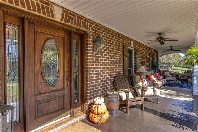899 Gunter Ridge Road Pulaski, TN 38478 - Photo 3 of 20 Enjoy Your Morning Coffee On This Wonderful Covered Porch While Overlooking Beautiful Pastures.