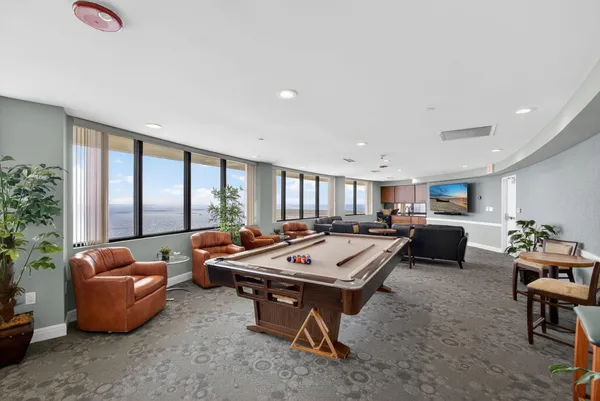 a view of a dining room with furniture