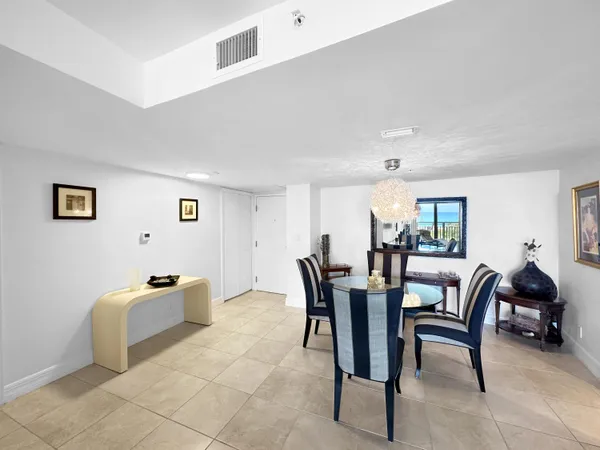 a view of a livingroom with furniture and window