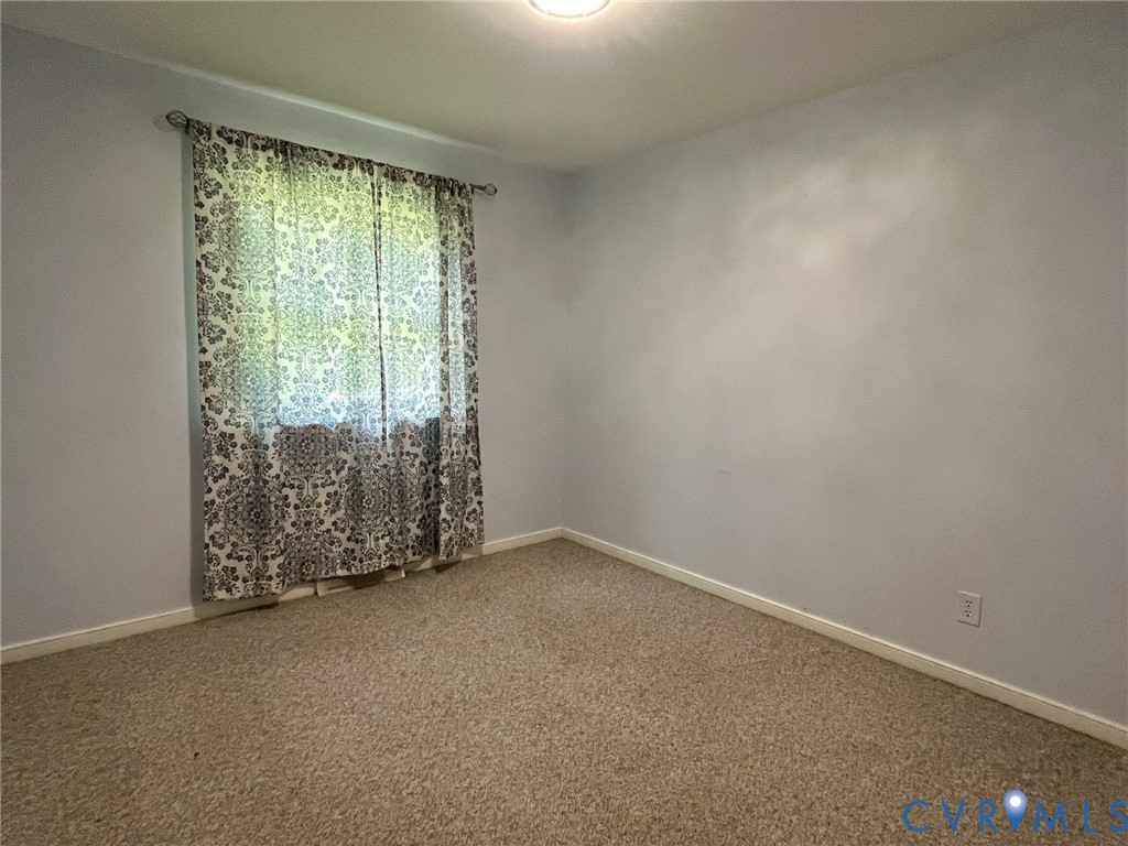 3911 Sunburst Road Henrico, VA 23294 - Photo 18 of 27 an empty room with windows