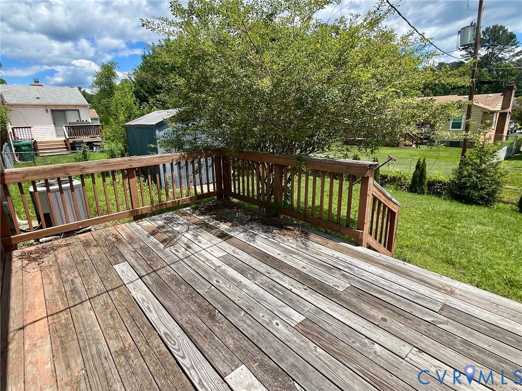 3911 Sunburst Road Henrico, VA 23294 - Photo 24 of 27 a balcony with view of trees in the background