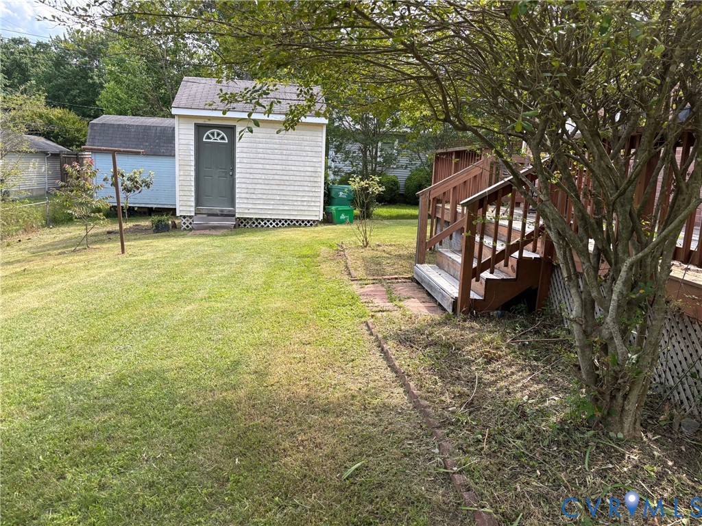 3911 Sunburst Road Henrico, VA 23294 - Photo 25 of 27 a view of a house with a yard and sitting area
