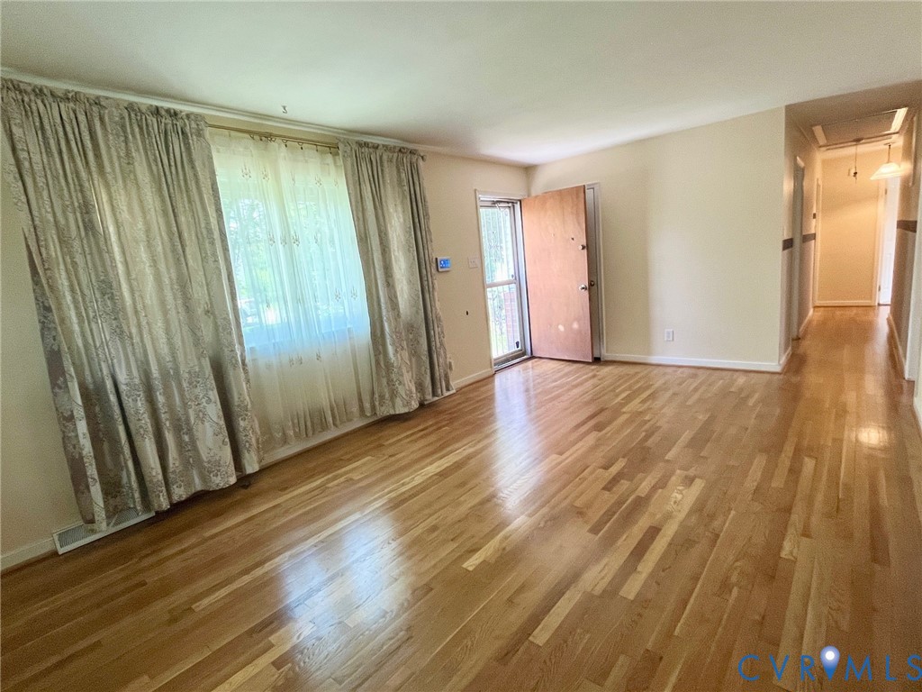 3911 Sunburst Road Henrico, VA 23294 - Photo 5 of 27 a view of a room with wooden floor and stairs