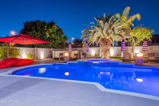 a view of a livingroom with wooden floor and a window