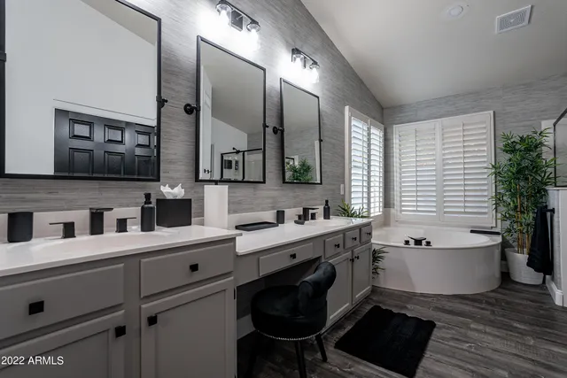 a bed room with a bed and a window