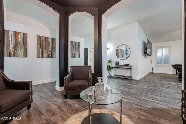 an outdoor space with furniture and umbrella