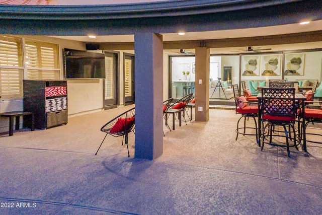 a view of a lake with a house in the background