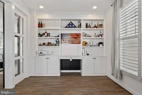 a bedroom with a bed and a cabinets