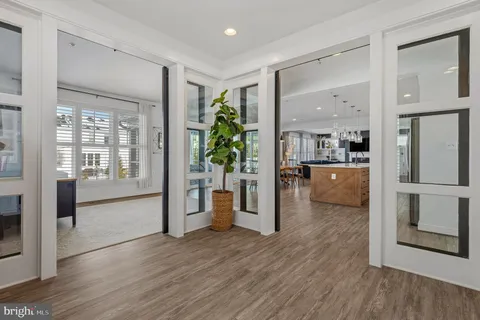 a bathroom with a double vanity sink and mirror