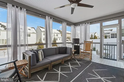 a bedroom with bed and a chandelier