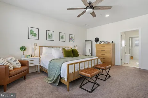 a bathroom with a toilet and a sink