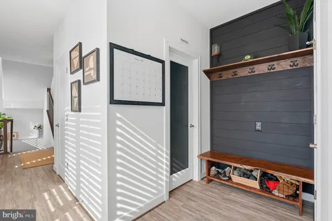 a kitchen with stainless steel appliances kitchen island granite countertop a stove a sink and a microwave