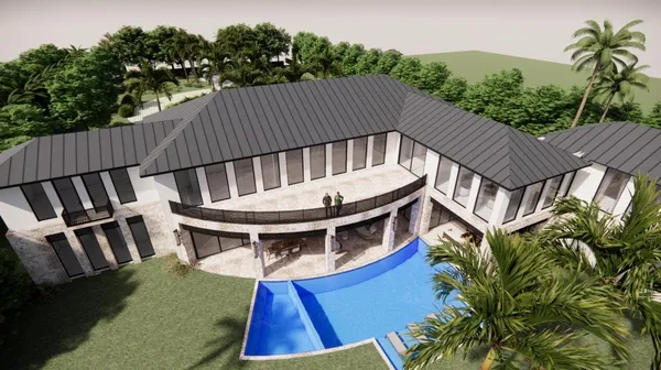 a view of a house with backyard and sitting area