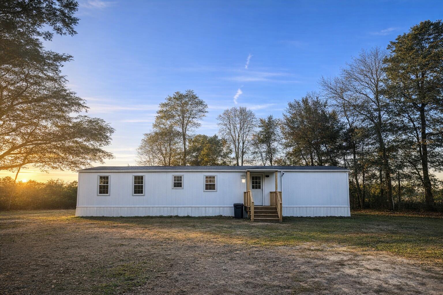 a view of a barn with a yard