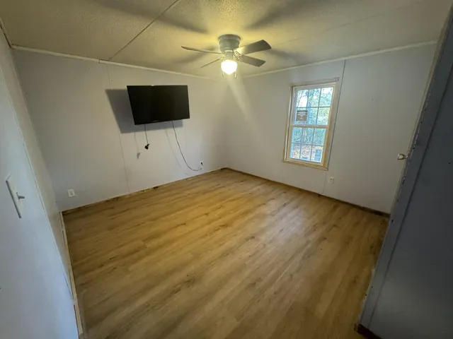 a view of a livingroom with a flat screen tv