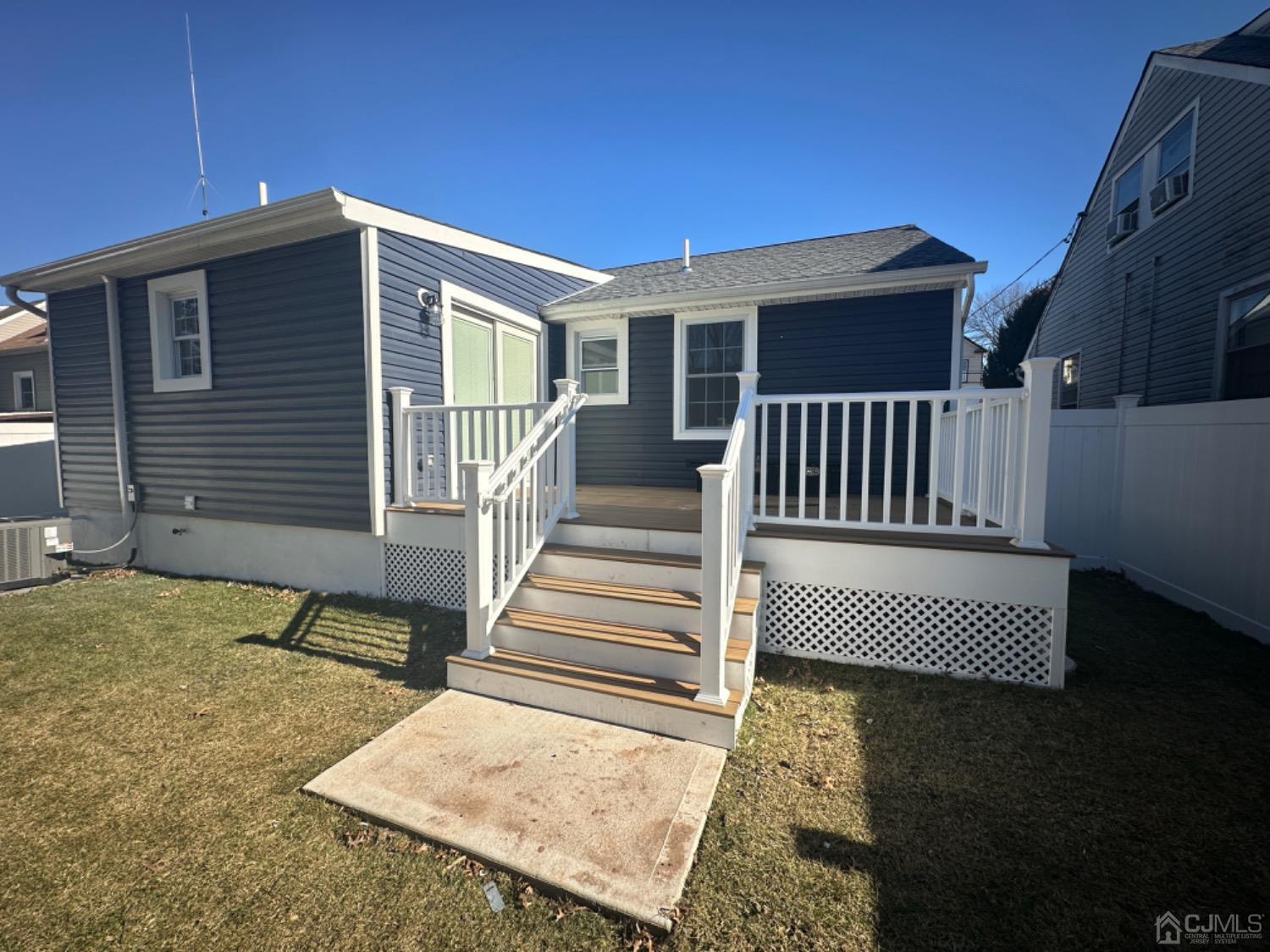 52 Central Avenue Sewaren, NJ 07064 - Photo 27 of 29 a front view of a house with stairs