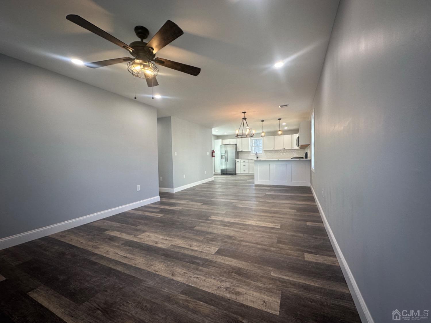 52 Central Avenue Sewaren, NJ 07064 - Photo 9 of 29 a view of a kitchen with a sink and wooden floor