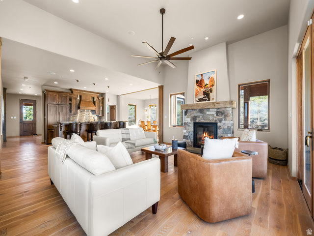 22677 East Snowbird Drive, Unit 47 Helper, UT 84526 - Photo 6 of 43 Living area featuring a ceiling fan, a fireplace, light wood-style flooring, and recessed lighting
