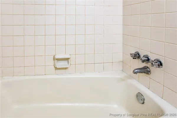 a bathroom with a bathtub