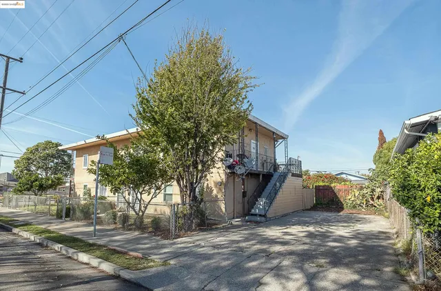 a view of a backyard of the house