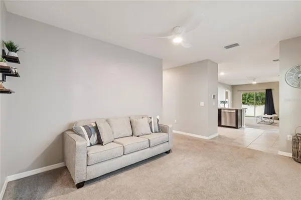 a living room with furniture and a couch