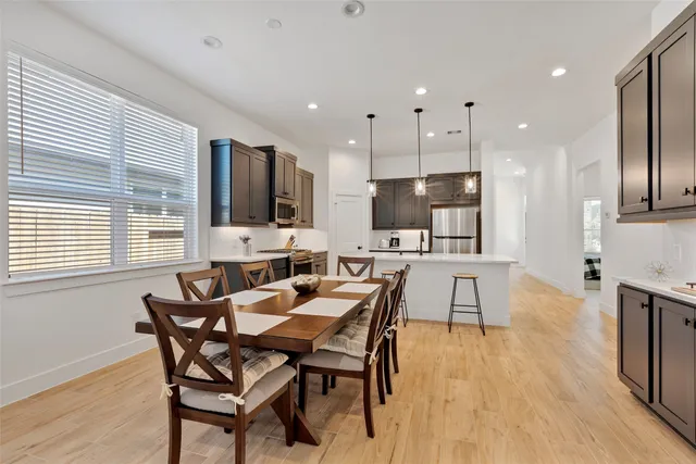 a view of a dining room with furniture