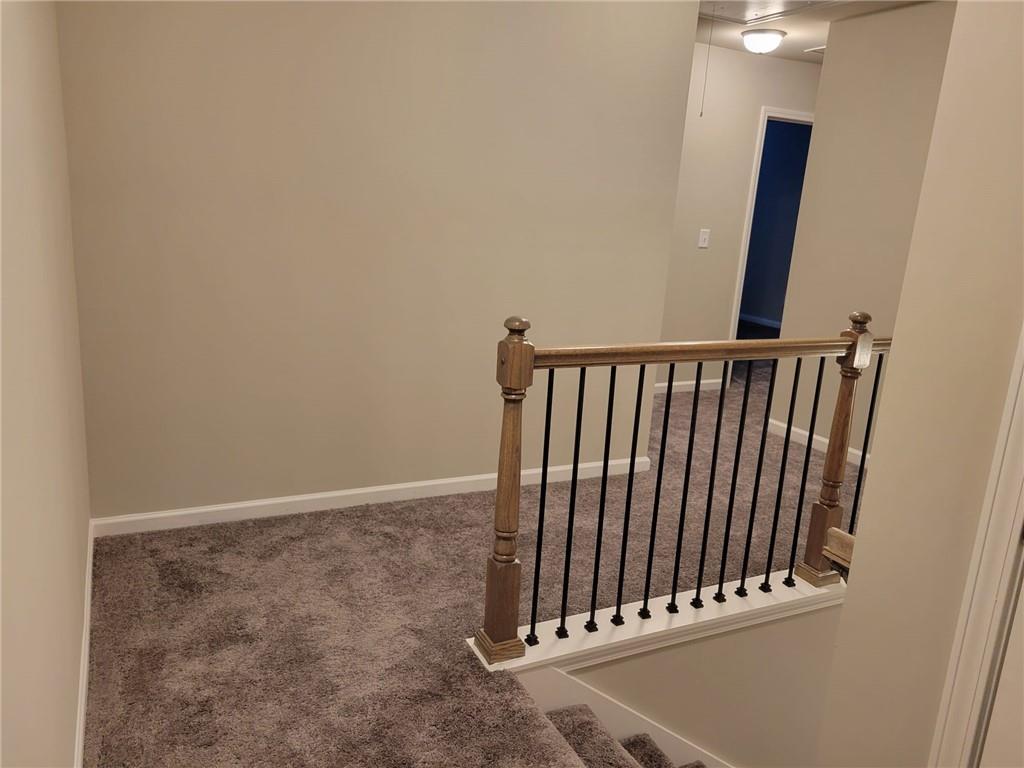 5205 Fox Den Road Oakwood, GA 30566 - Photo 11 of 19 a view of a hallway with staircase