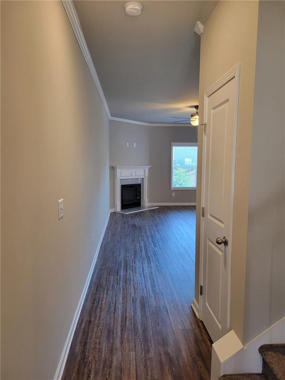 5205 Fox Den Road Oakwood, GA 30566 - Photo 4 of 19 wooden floor in an empty room with a window