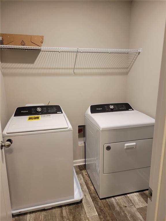 5205 Fox Den Road Oakwood, GA 30566 - Photo 9 of 19 a utility room with dryer and washer