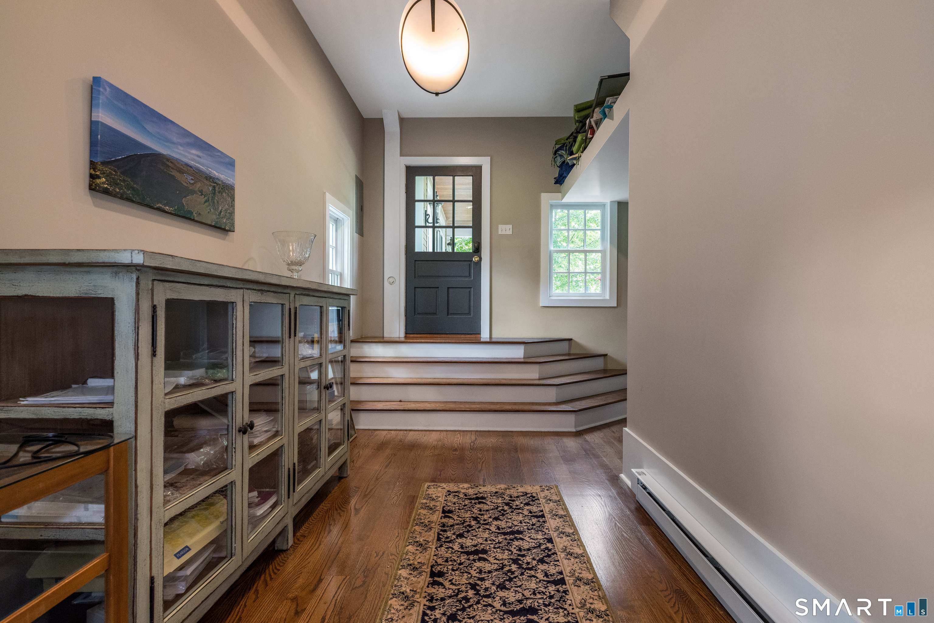 63 Broad Street Guilford, CT 06437 - Photo 13 of 40 a room with furniture and a window