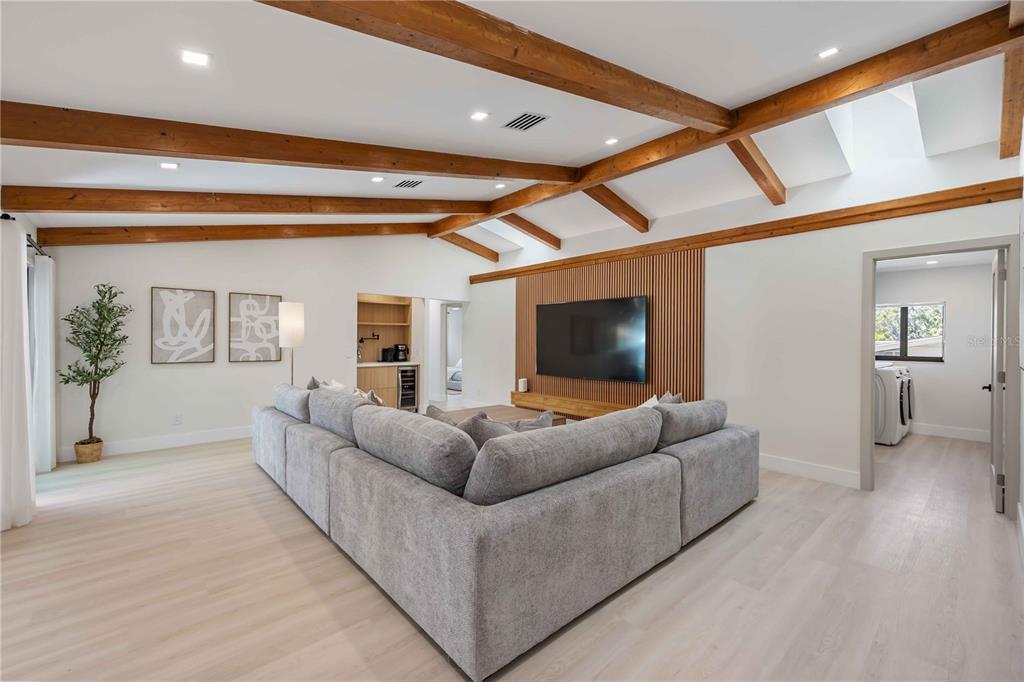 105 Sinclair Street Southeast Port Charlotte, FL 33952 - Photo 23 of 69 a living room with furniture and a flat screen tv