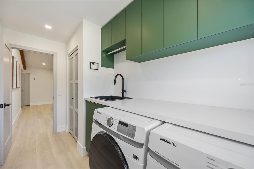 105 Sinclair Street Southeast Port Charlotte, FL 33952 - Photo 44 of 69 a utility room with dryer and washer