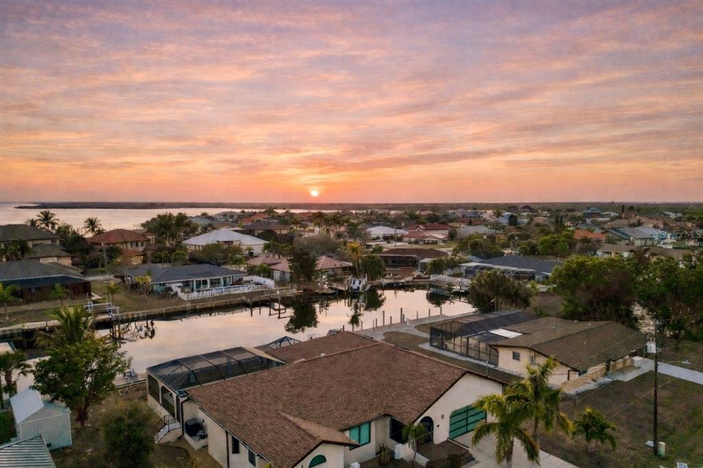 105 Sinclair Street Southeast Port Charlotte, FL 33952 - Photo 54 of 69 an aerial view of a city with lots of residential buildings