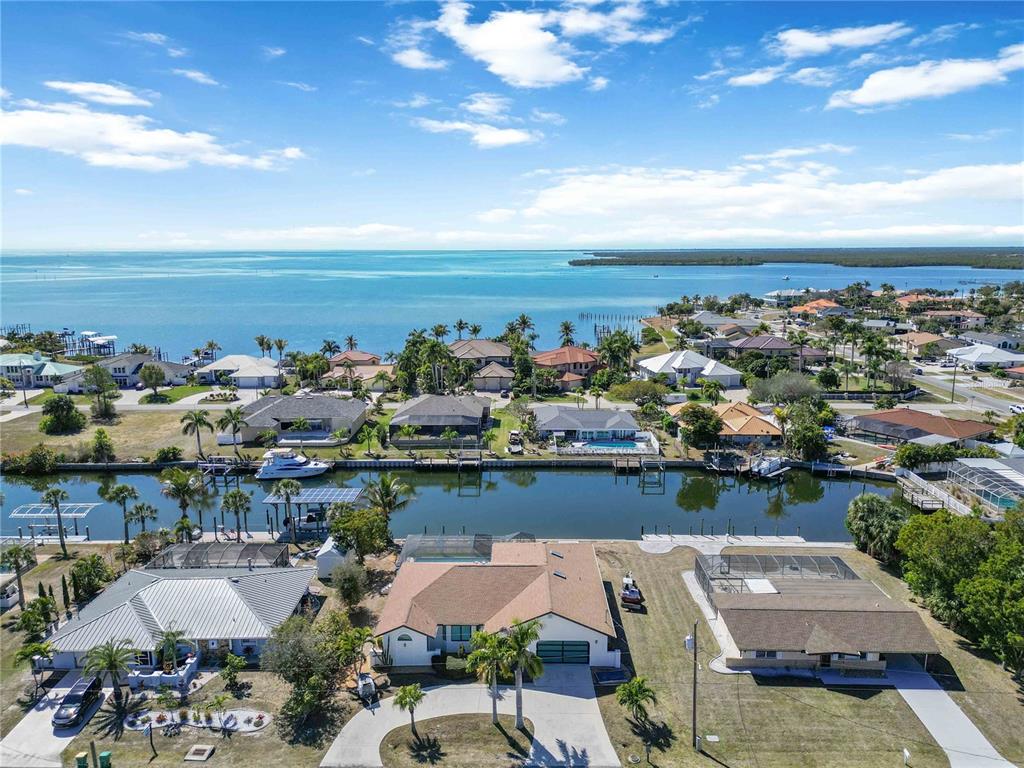 105 Sinclair Street Southeast Port Charlotte, FL 33952 - Photo 58 of 69 a view of a city with an ocean