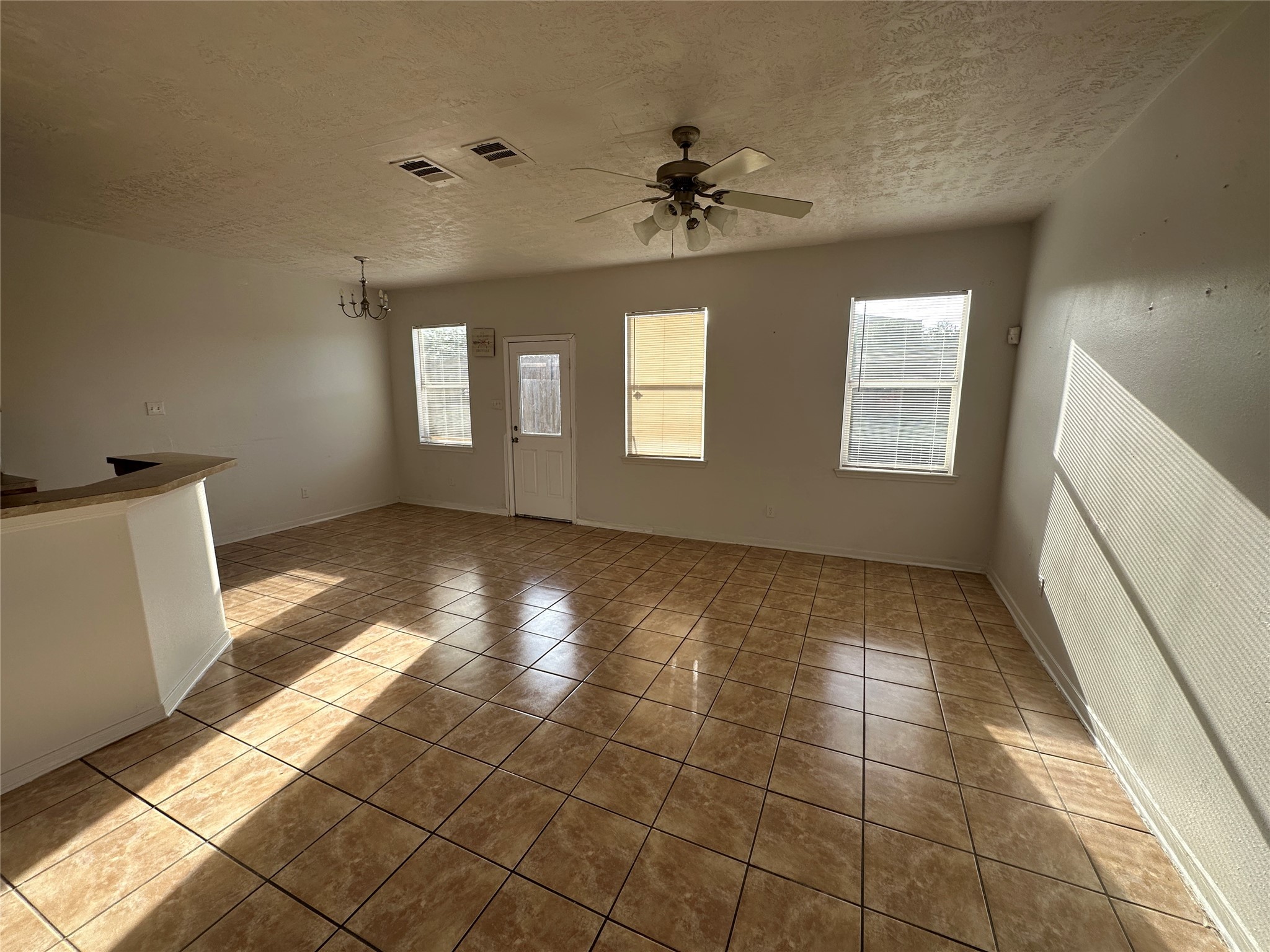 15931 Winston Point Lane Houston, TX 77084 - Photo 2 of 26 a view of an empty room with a window