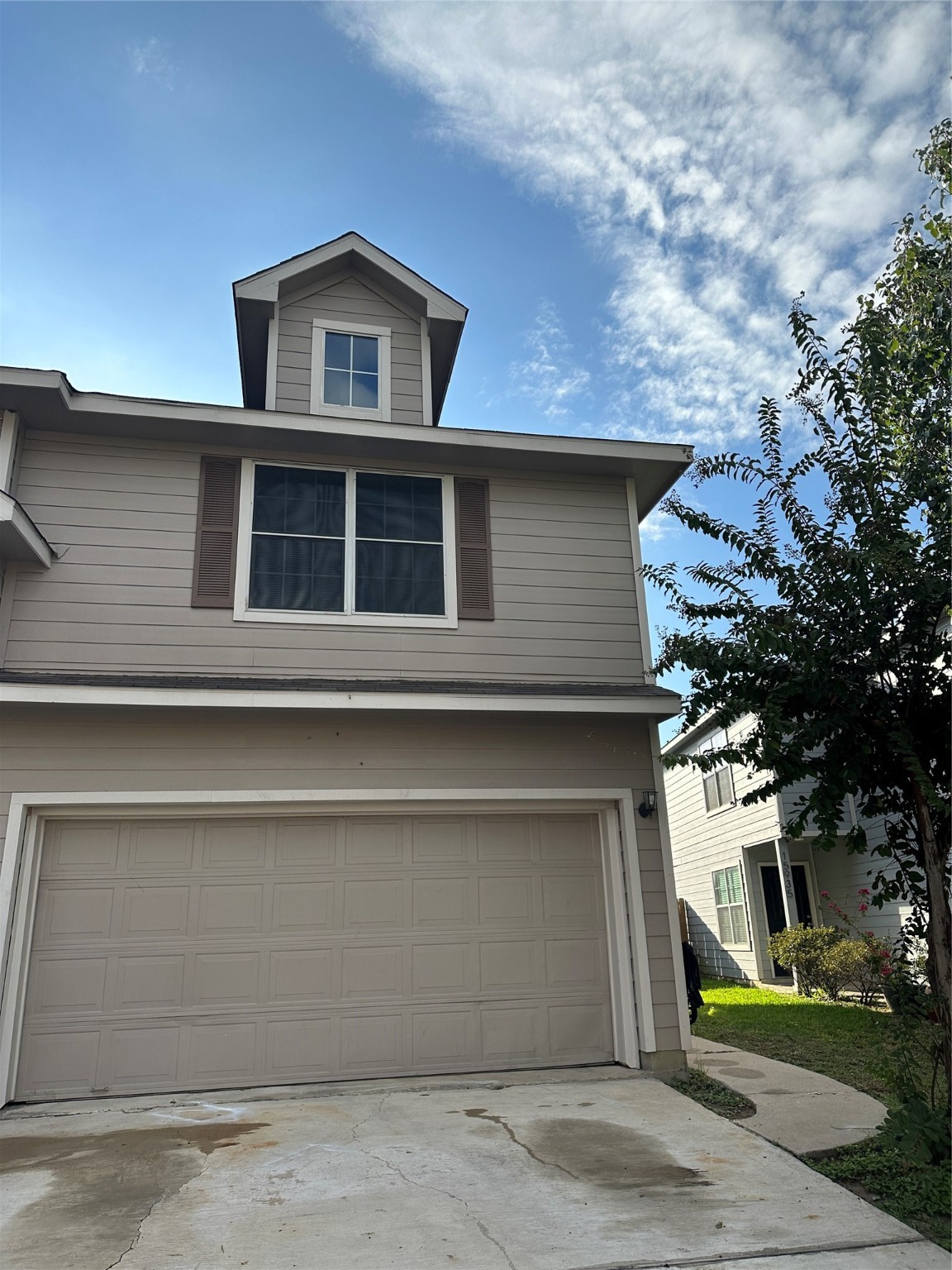 15931 Winston Point Lane Houston, TX 77084 - Photo 23 of 26 a front view of a house with a garage