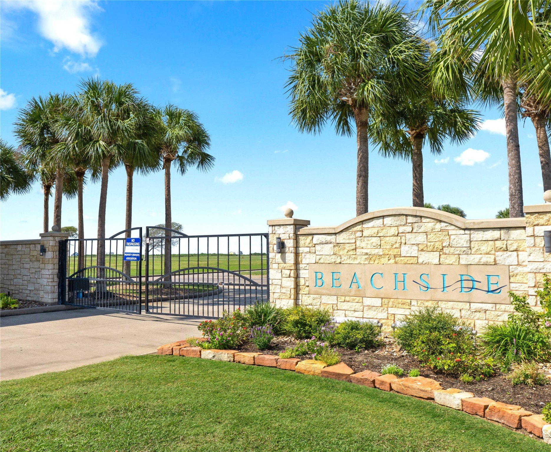 3003 Peninsula Point Drive Palacios, TX 77465 - Photo 4 of 17 a front view of a house with a garden