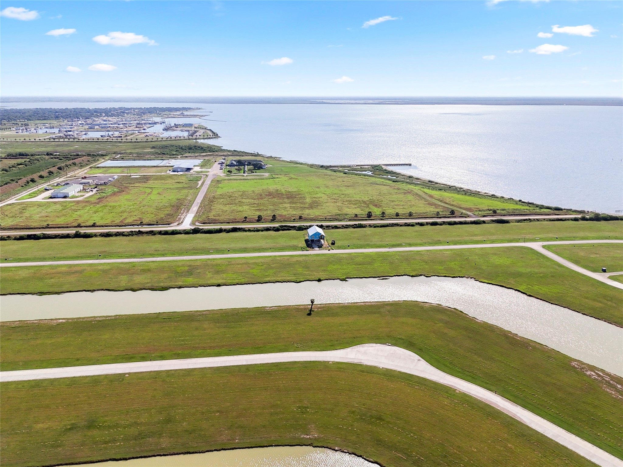 3003 Peninsula Point Drive Palacios, TX 77465 - Photo 10 of 17 a view of an swimming pool and an outdoor space