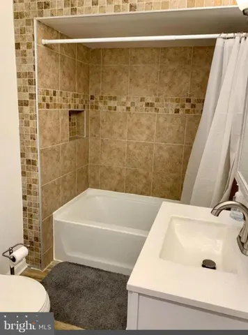 a bathroom with a white tub