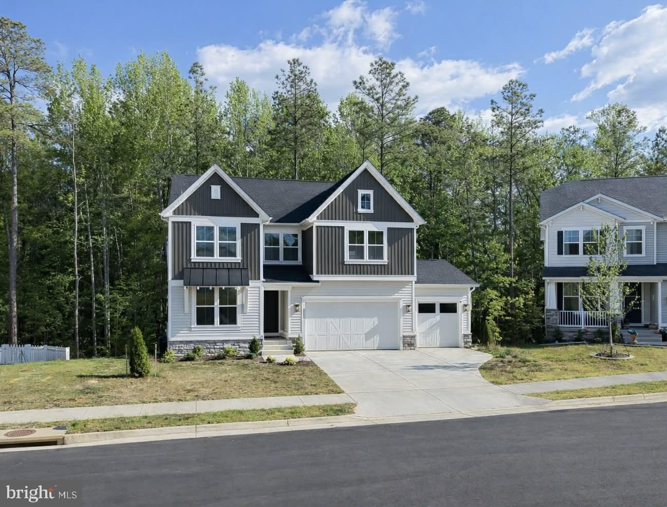 7119 Resolution Way Ruther Glen, VA 22546 - Photo 5 of 79 Charming home nestled among trees.