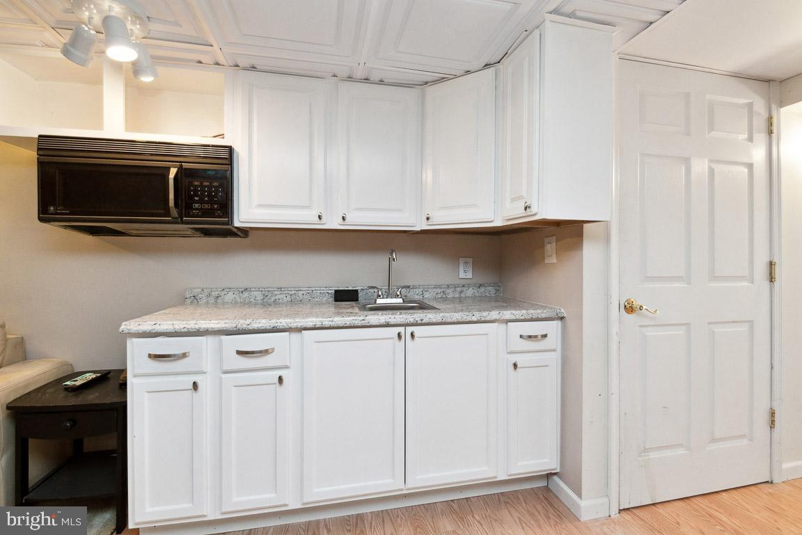 844 Dr Jack Road Conowingo, MD 21918 - Photo 32 of 46 Finished Basement wet bar kitchenette