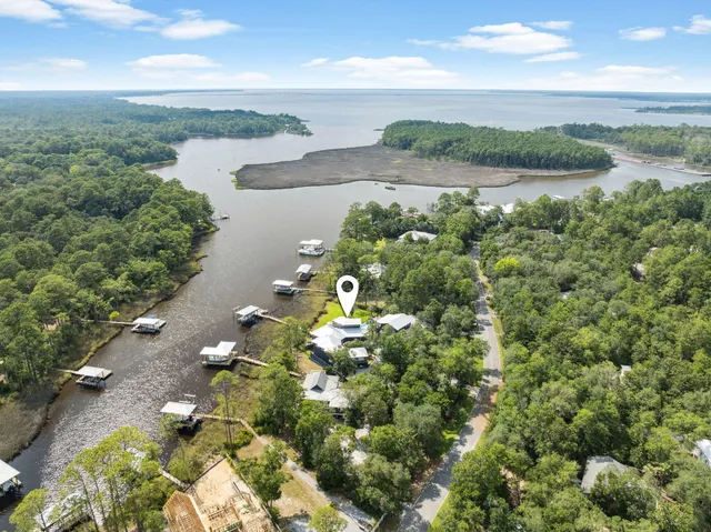 an aerial view of a house with outdoor space