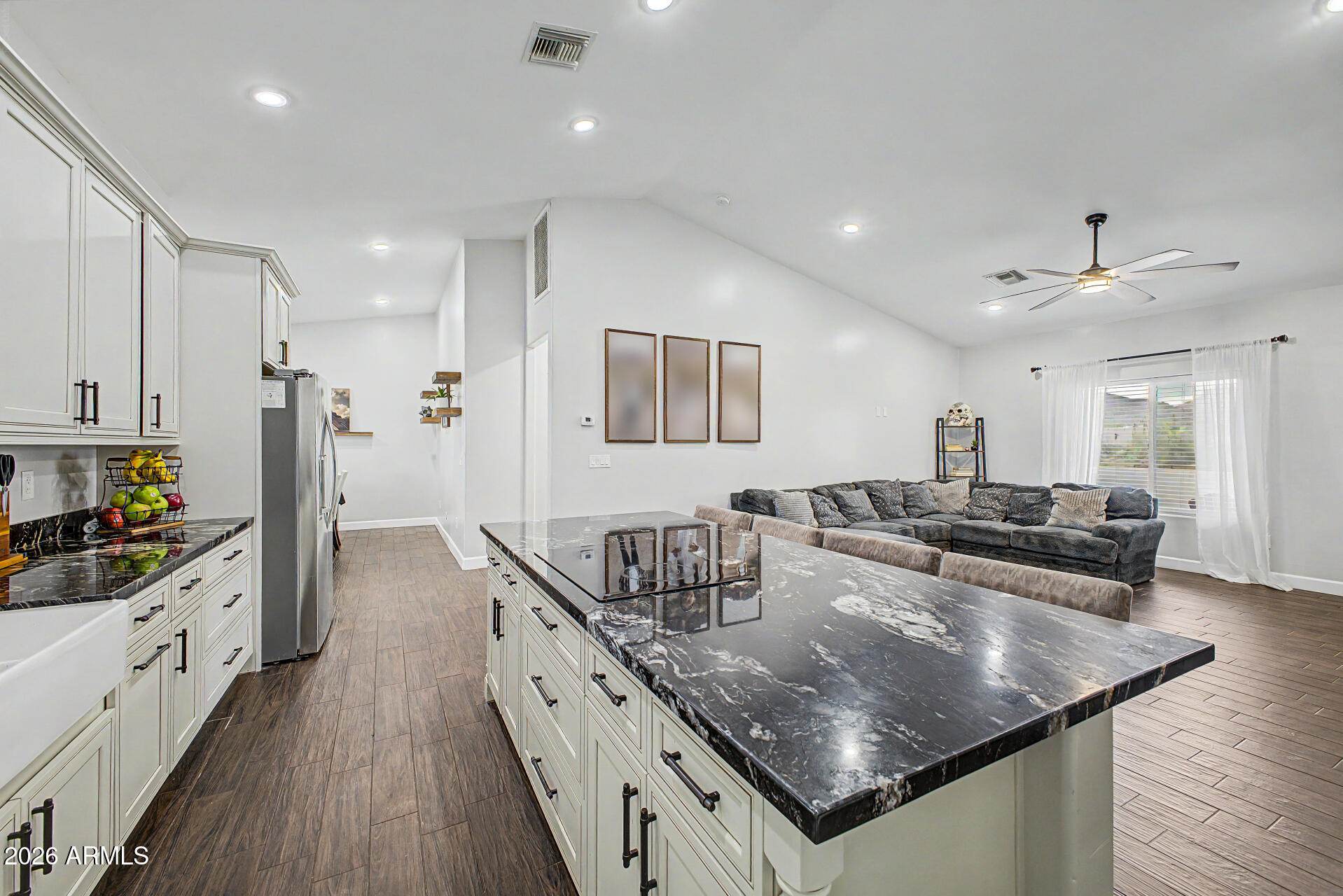 1427 East Whiteley Street Apache Junction, AZ 85119 - Photo 16 of 59 a kitchen with granite countertop a sink counter top space and stainless steel appliances