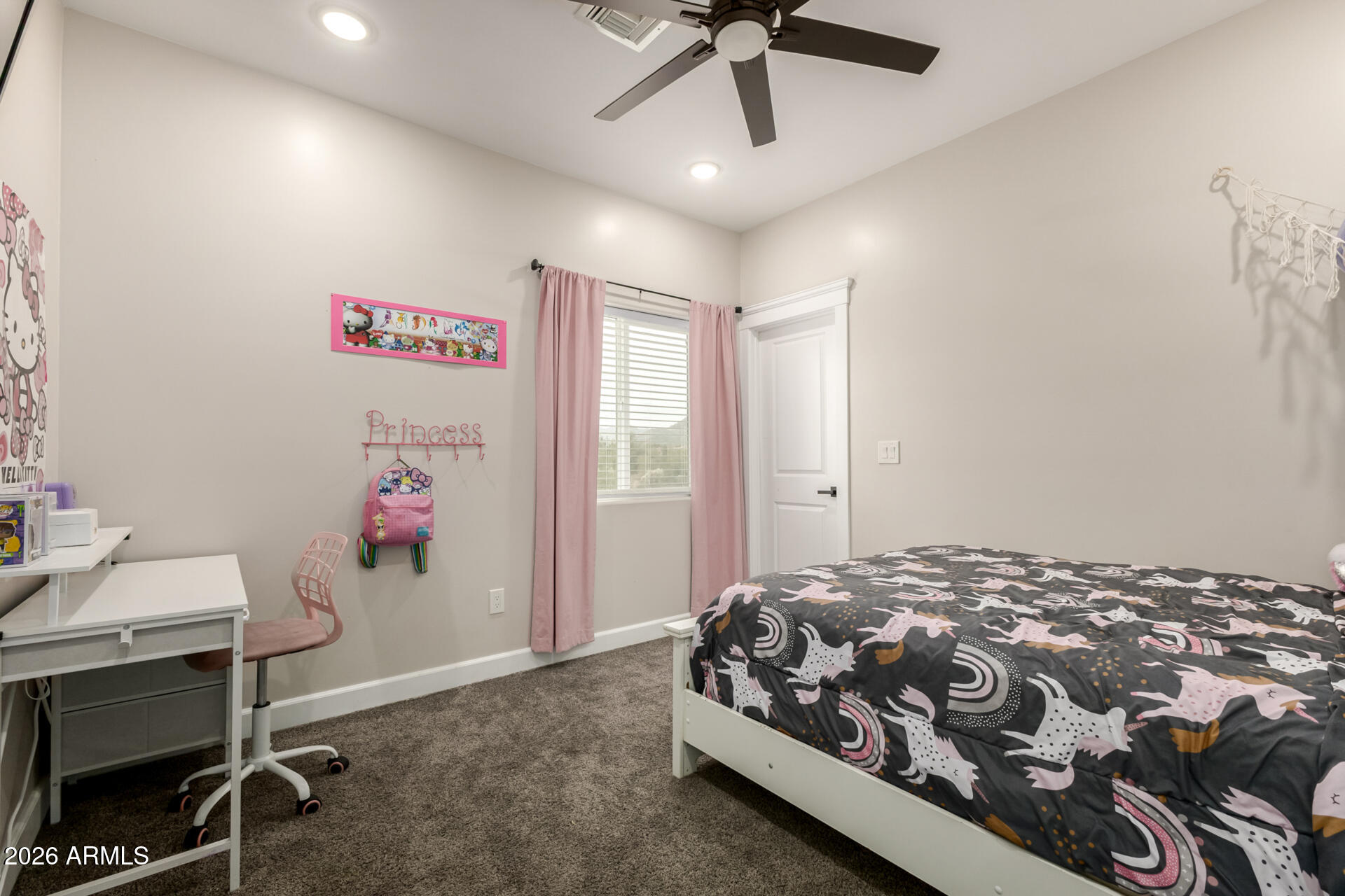 1427 East Whiteley Street Apache Junction, AZ 85119 - Photo 28 of 59 a bedroom with a bed and a dresser