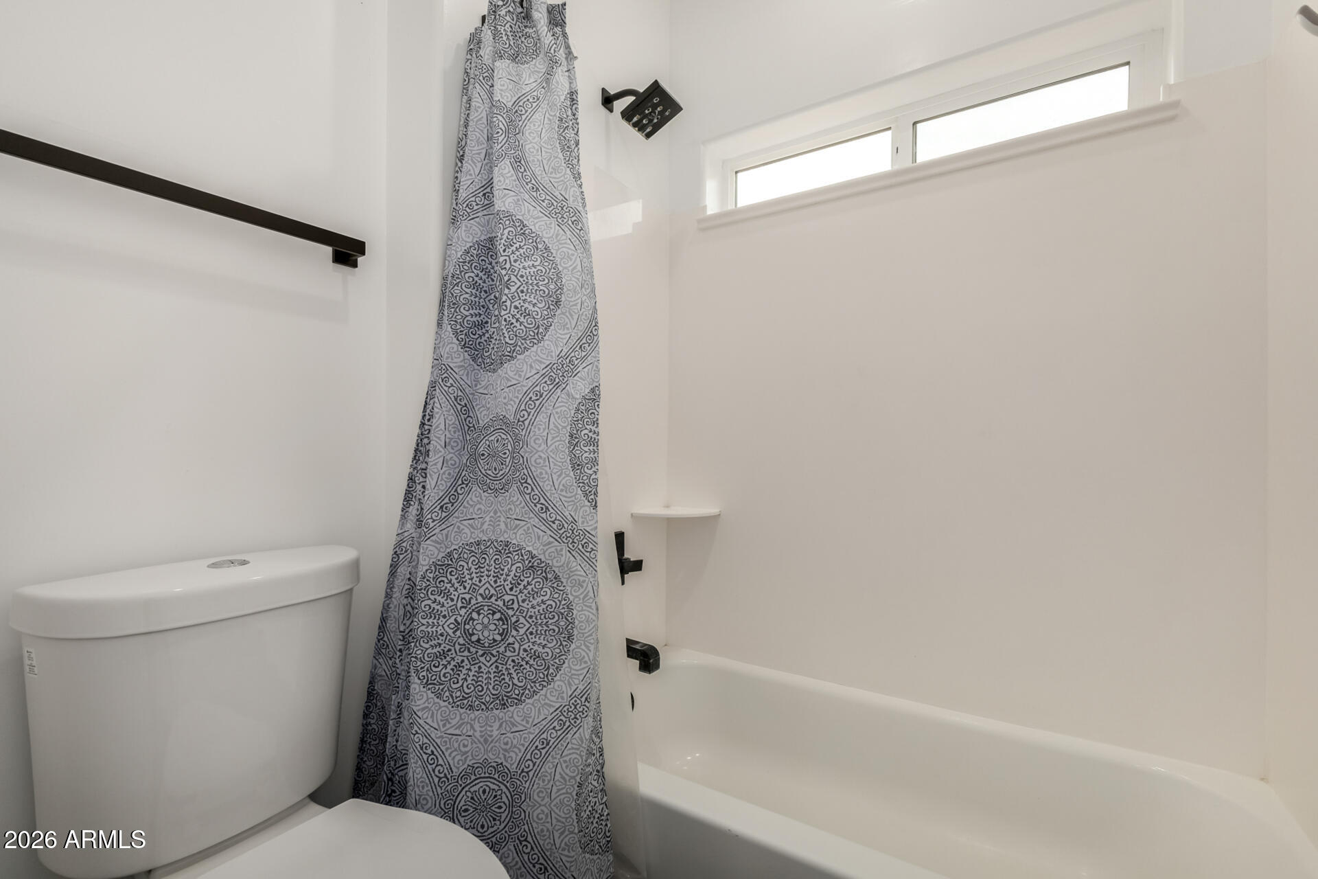 1427 East Whiteley Street Apache Junction, AZ 85119 - Photo 31 of 59 a bathroom with a toilet bathtub and shower