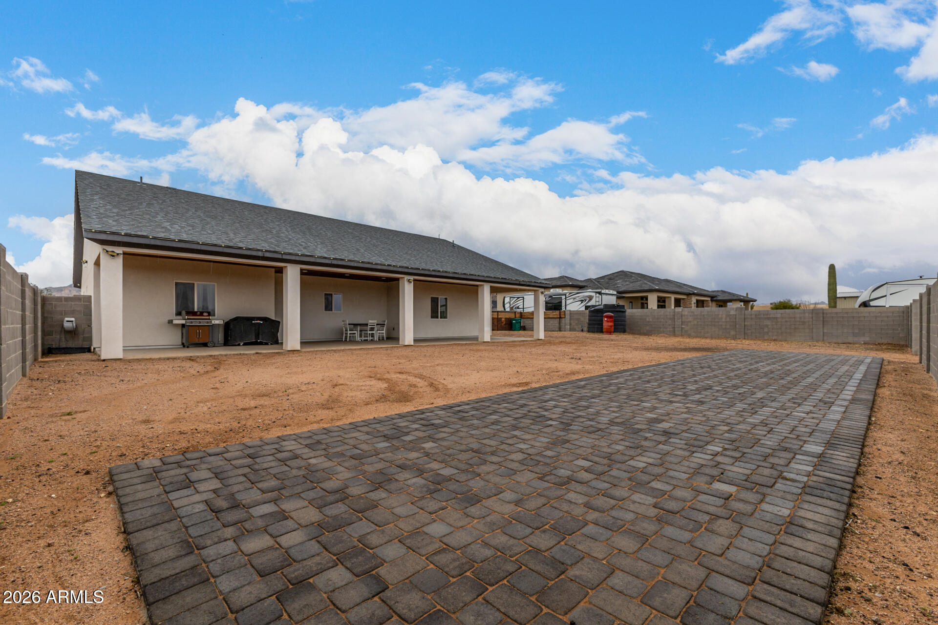 1427 East Whiteley Street Apache Junction, AZ 85119 - Photo 34 of 59 a view of house with yard and entertaining space