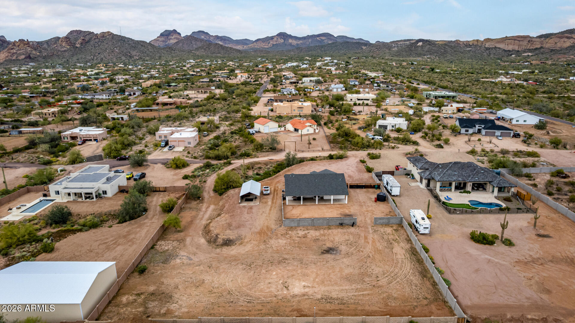 1427 East Whiteley Street Apache Junction, AZ 85119 - Photo 49 of 59 an aerial view of residential houses with outdoor space