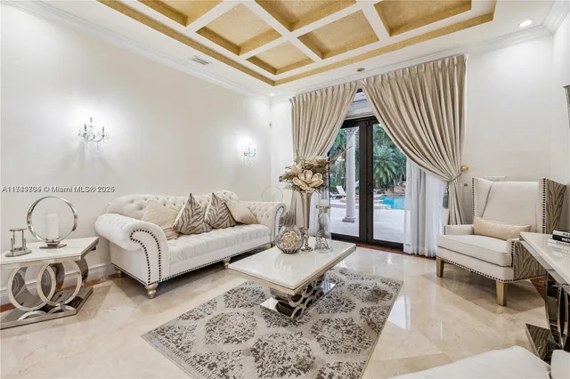 a large kitchen with stainless steel appliances lots of counter space and a sink